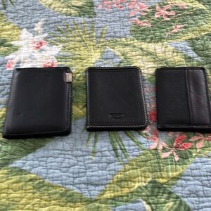 Coach, Travelon, and Mundi wallets